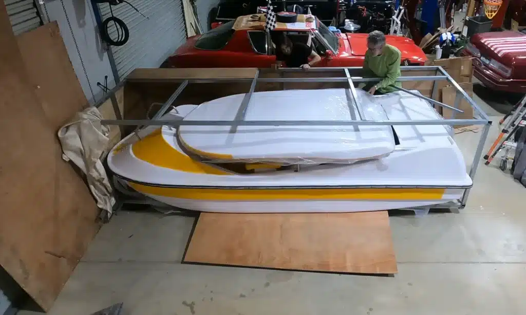 man shocked while unboxing $1,000 electric boat from China