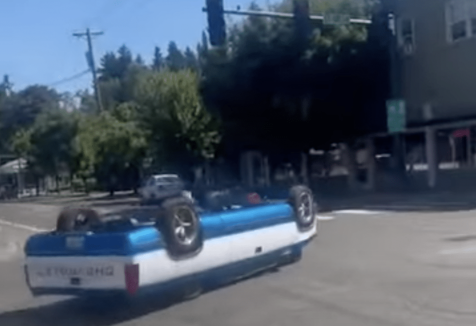 Upside-down car driving the streets leaves internet confused