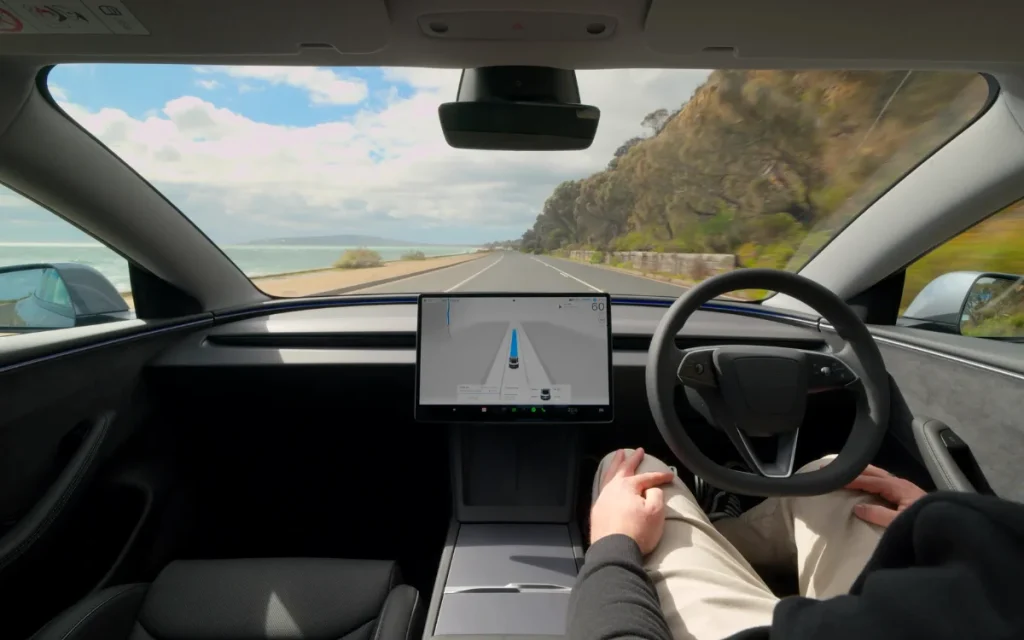 Tesla’s new Full Self-Driving v14 update adds Robotaxi features, new parking options, and self-cleaning cameras, but it’s still not truly autonomous