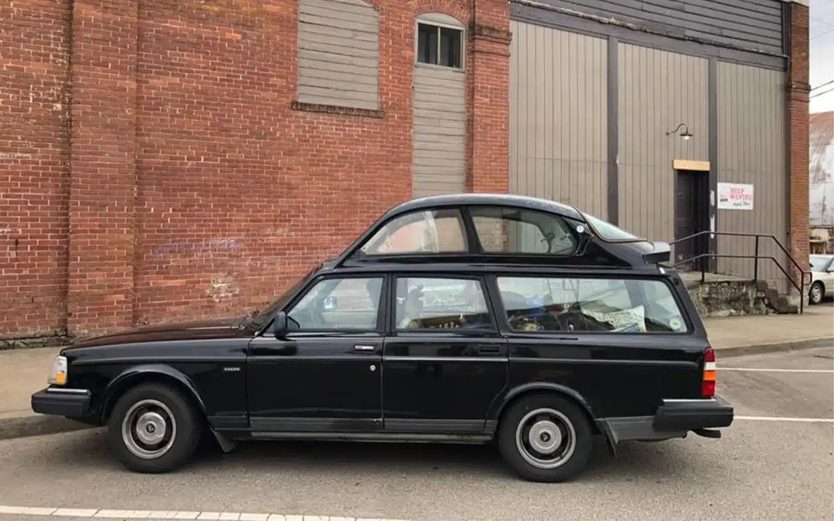 Volvo 240 turned into campervan by someone putting a Saab on top of it