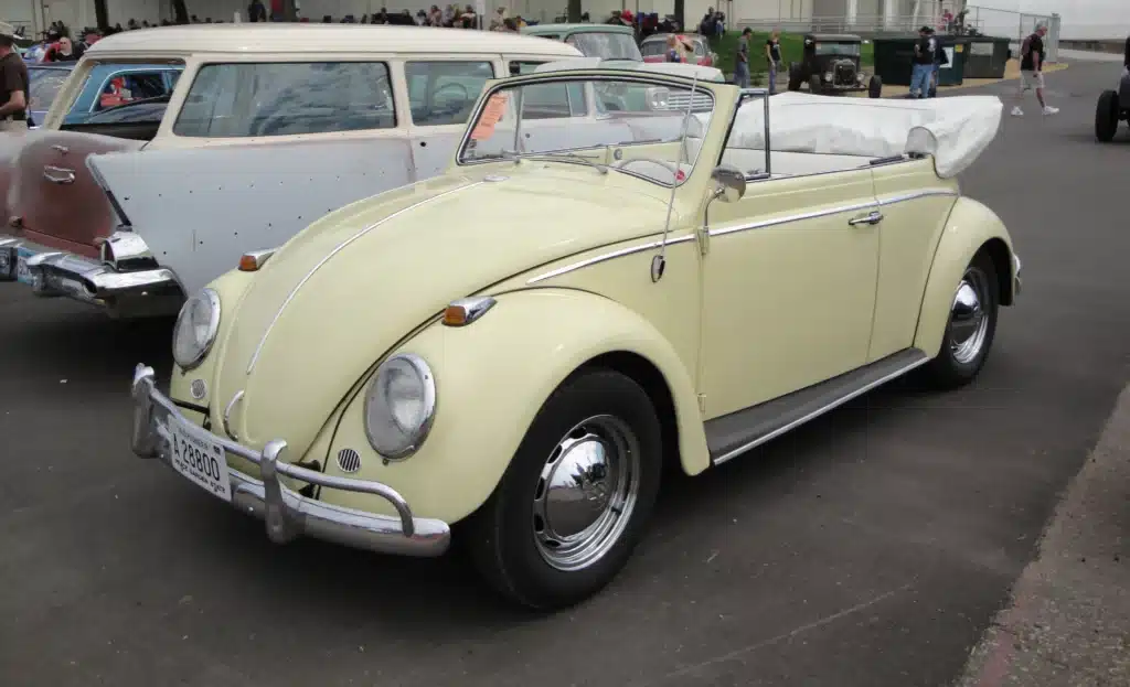 Albert Klein with his Volkswagen Beetle