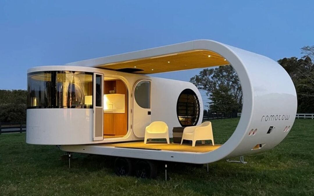 This futuristic camper swivels out to create an undercover decking area