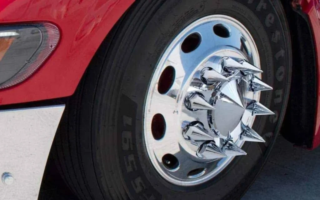 Semi truck wheel spikes look intimidating, but they’re actually protective covers designed to prevent rust and keep wheel fasteners clean
