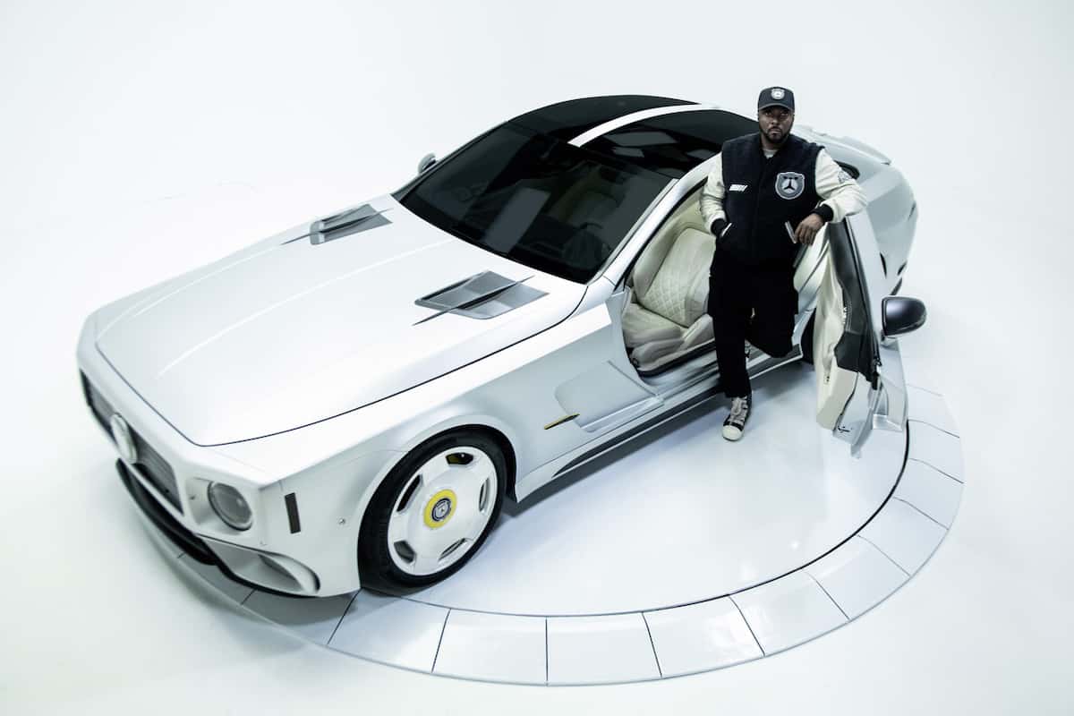 will.i.am standing with his custom Mercedes-AMG