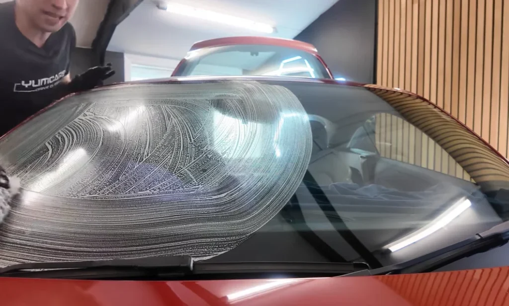 A pro detailer reveals the real cause of that stubborn interior windshield haze and the simple squeegee trick to clear it for good