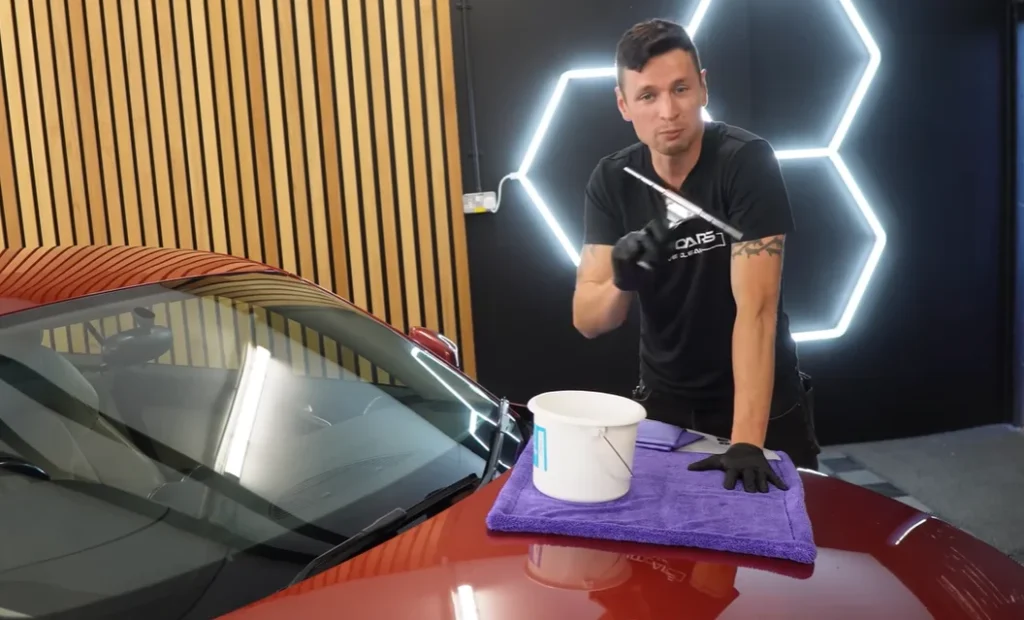 A pro detailer reveals the real cause of that stubborn interior windshield haze and the simple squeegee trick to clear it for good
