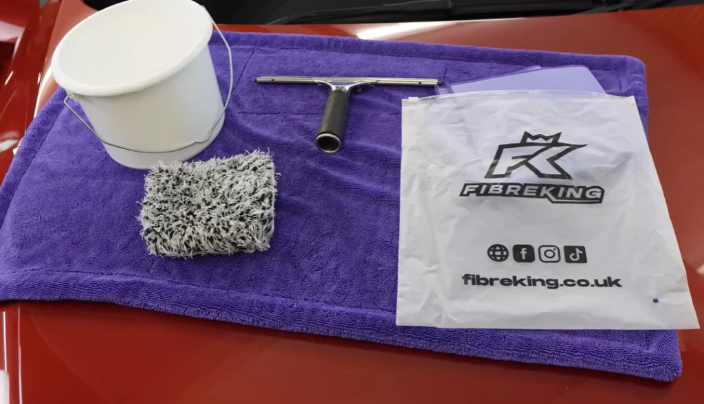 A pro detailer reveals the real cause of that stubborn interior windshield haze and the simple squeegee trick to clear it for good