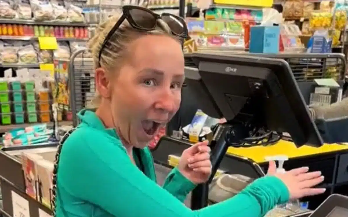 Woman pays for shopping with chip in her hand