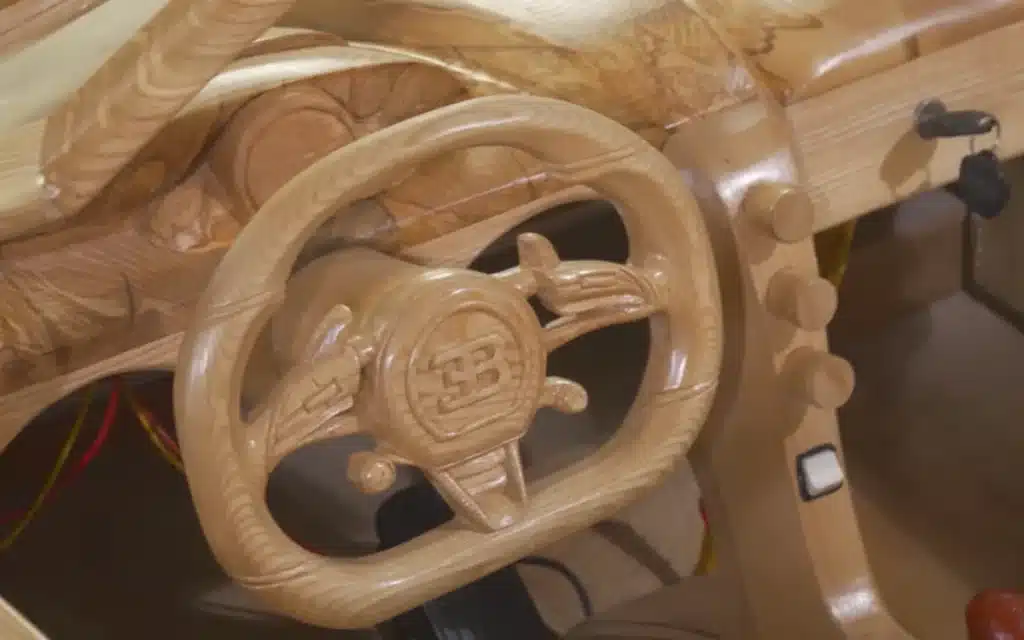 A Vietnamese carpenter has crafted a stunning wooden supercar - a fully detailed replica of Cristiano Ronaldo’s Bugatti Centodieci, complete with LED lights