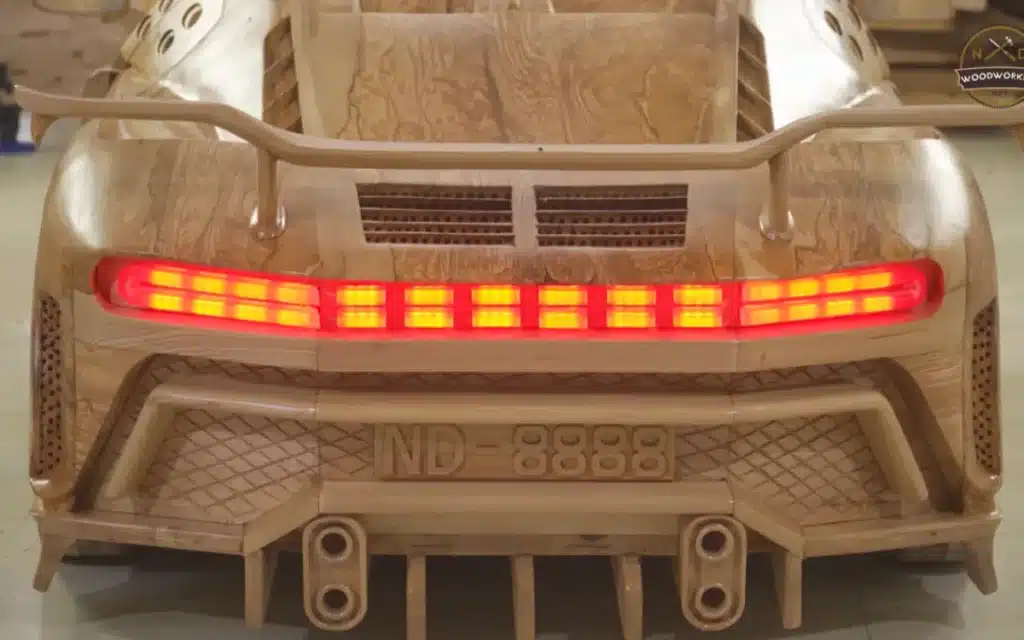 A Vietnamese carpenter has crafted a stunning wooden supercar - a fully detailed replica of Cristiano Ronaldo’s Bugatti Centodieci, complete with LED lights